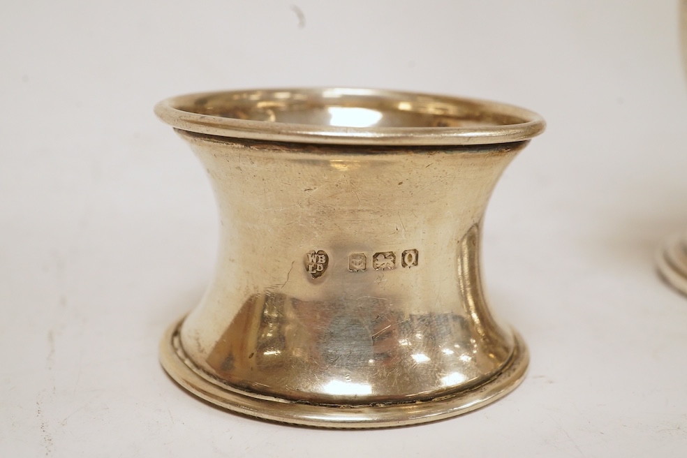 An Elizabeth II silver sugar caster, by Edward Barnard & Sons Ltd, London, 1959, 16.4cm, together with a silver napkin ring. Condition - fair